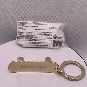 Authentic Burberry New -Rare- GWP Gold Skateboard Bag Charm / Keychain